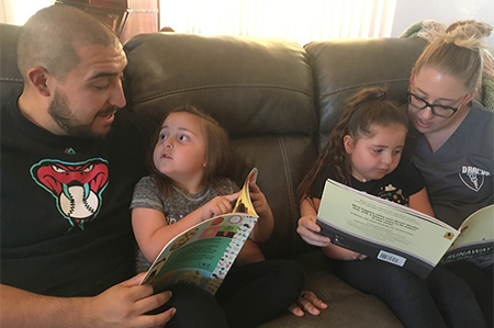 parents-reading-to-kids