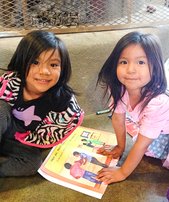 sisters-reading-book