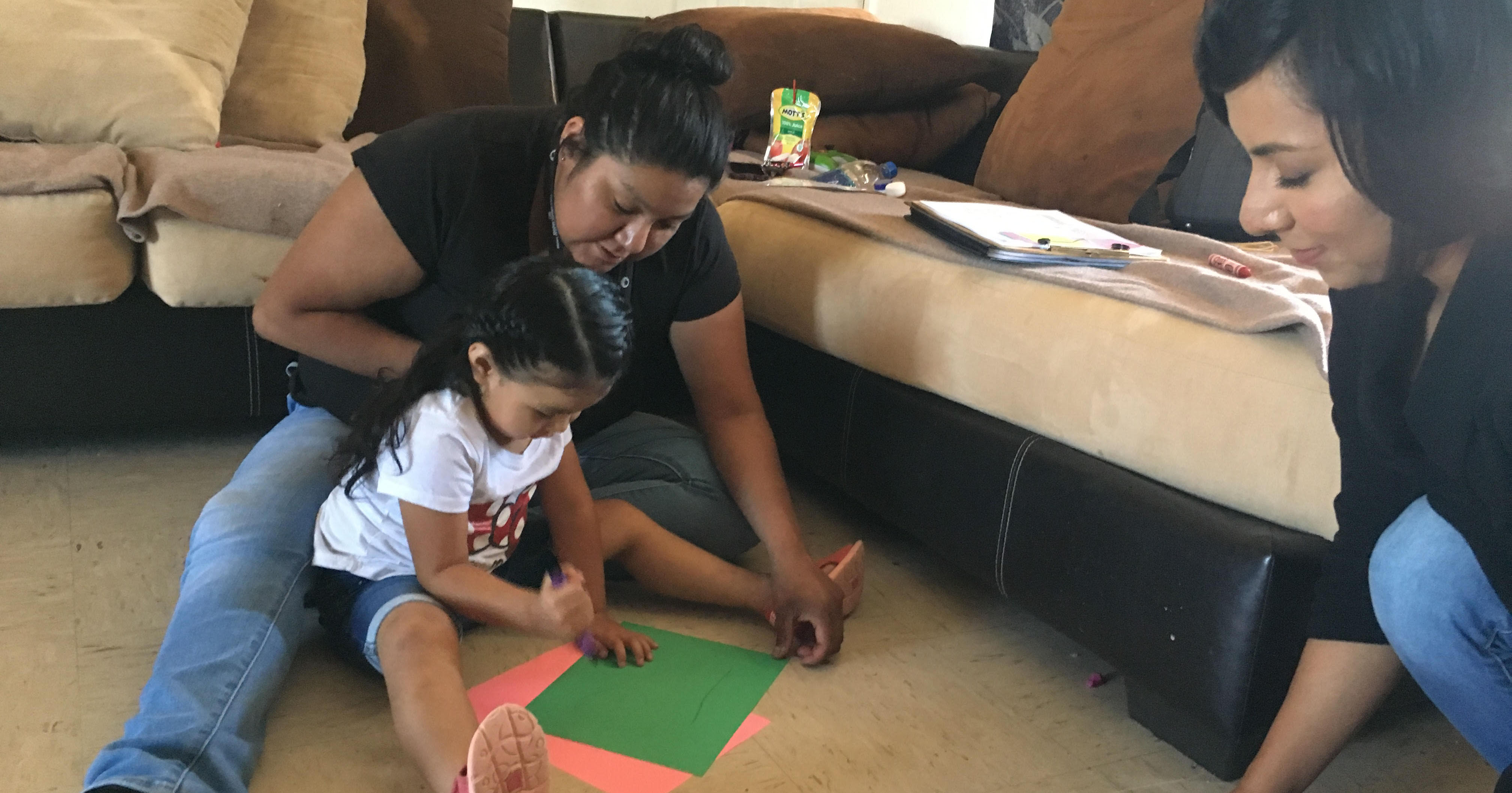 Mother and daughter with parent educator