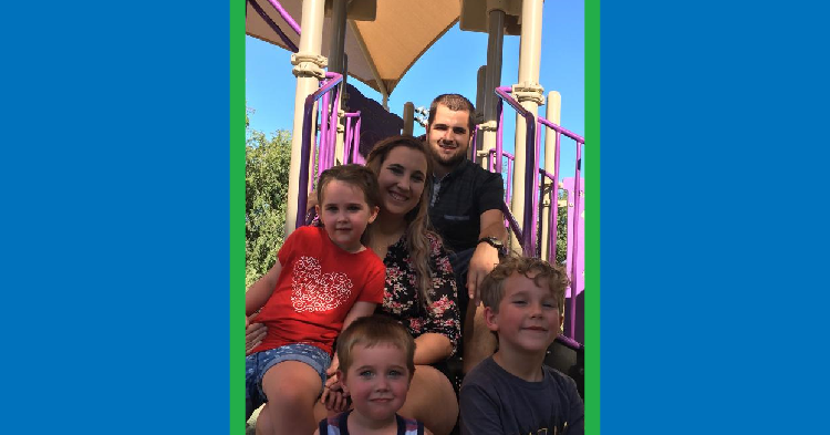 Family on playground slide