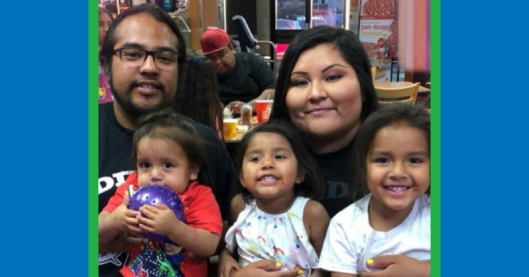 Mother and father with three kids