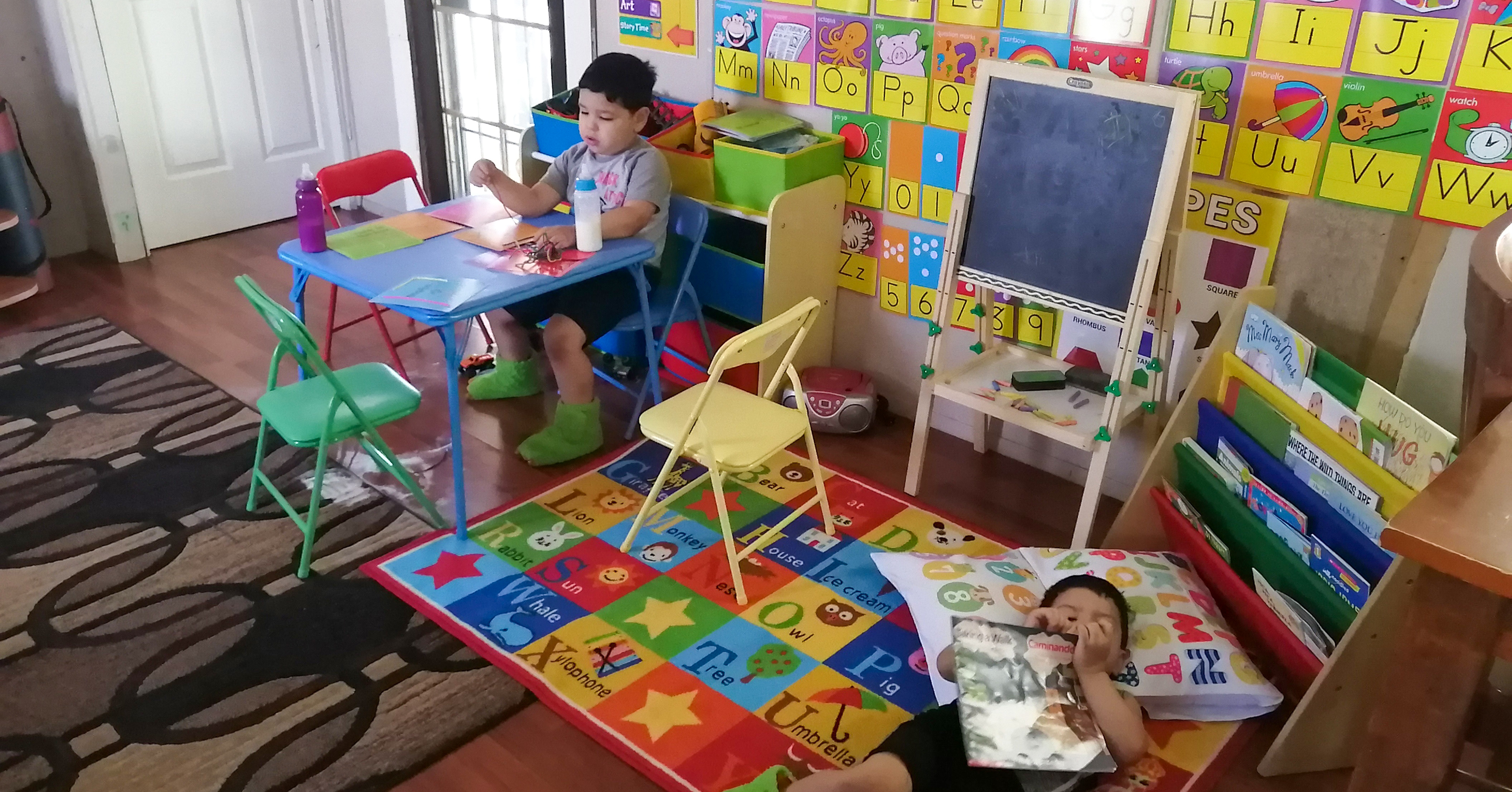 Two boys in a preschool classroom