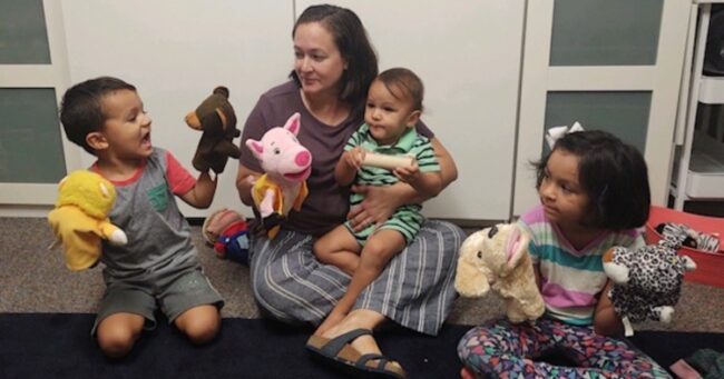family resource centers, southeast Maricopa 2022 Impact Report story, mom sitting on floor playing with kids