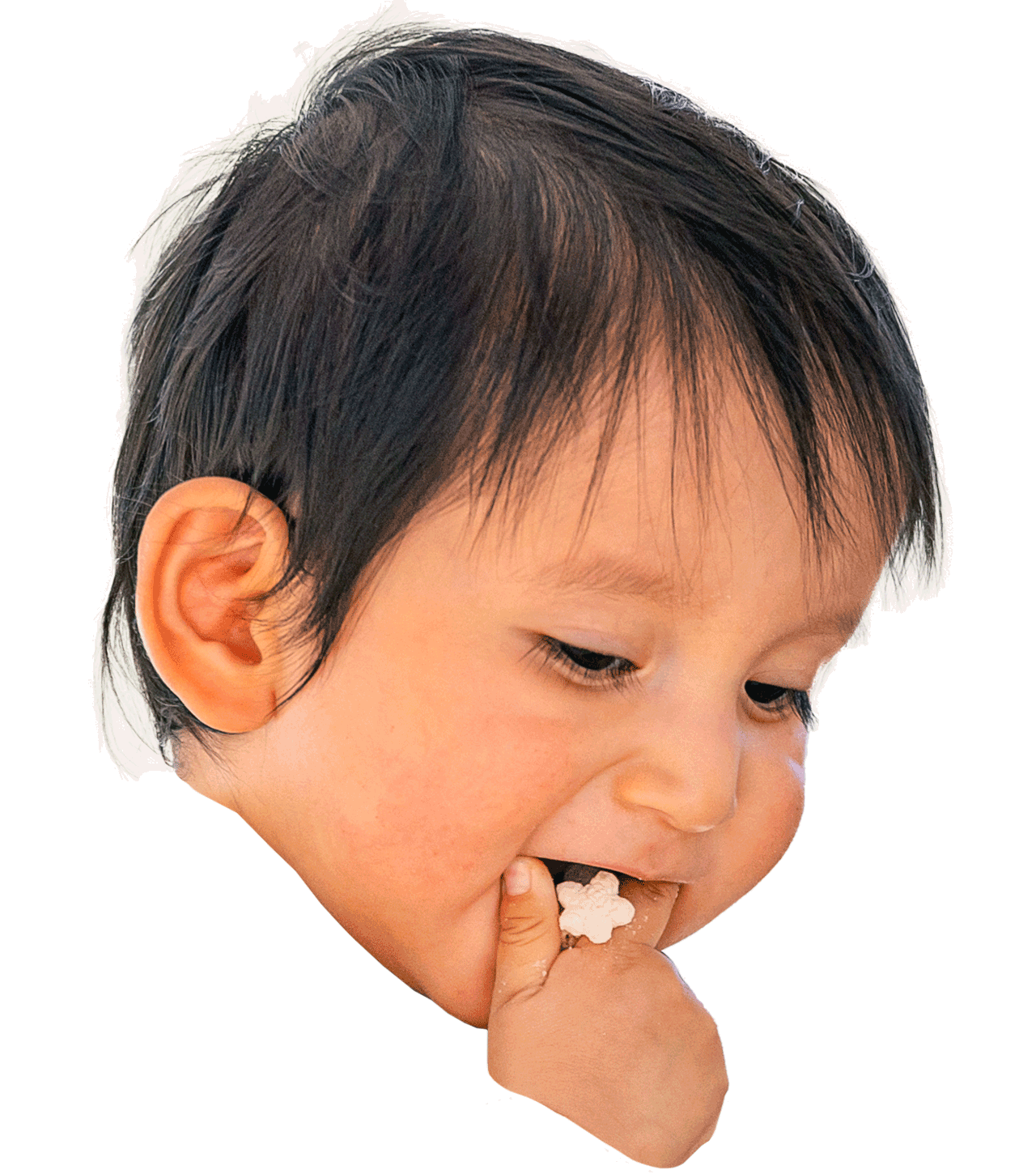 Face of a child eating cereal